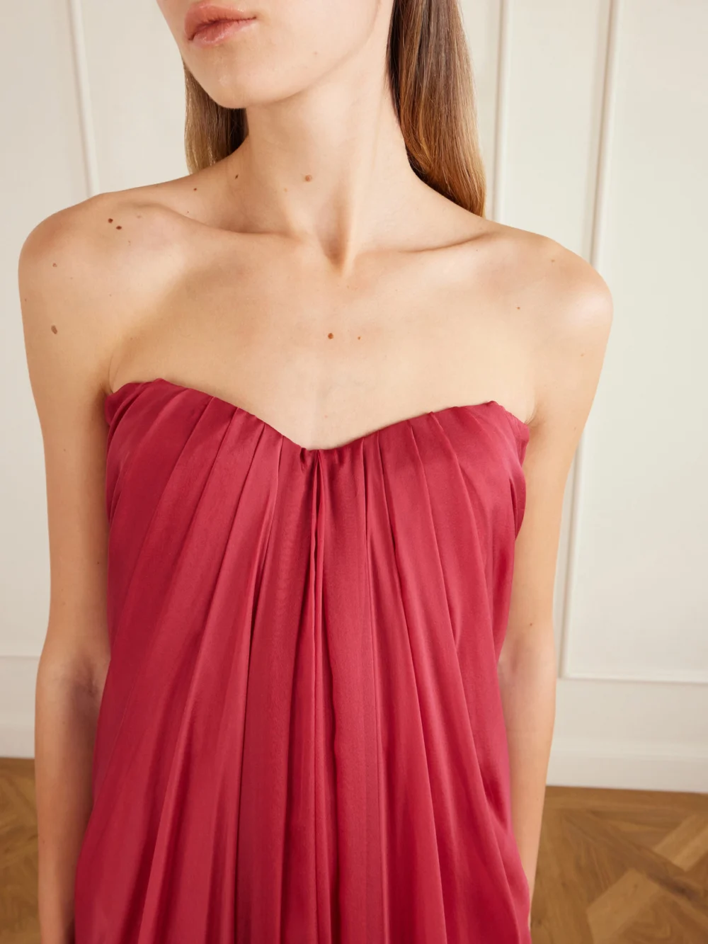 Close-up detail of the Alexander McQueen Strapless Draped Silk-chiffon Bustier Gown