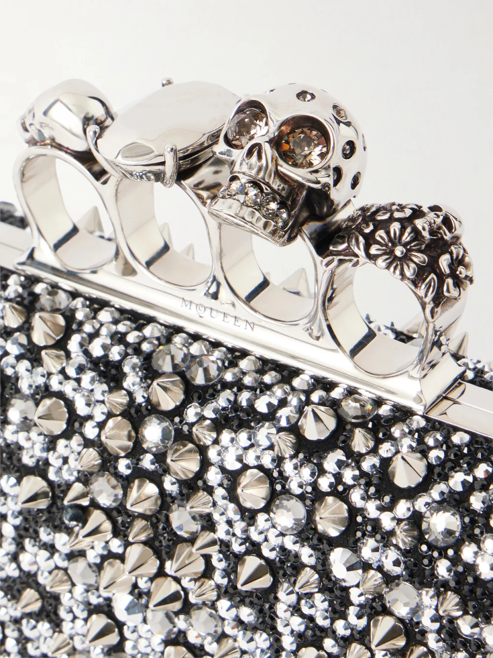 Close-up detail of the Alexander McQueen Studded Crystal-embellished Satin Clutch