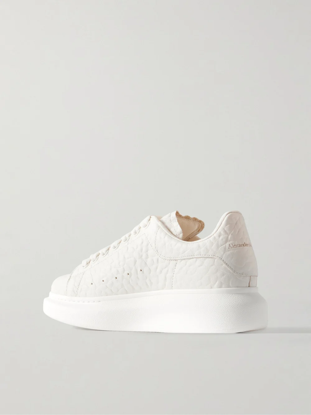 Back view of the Alexander McQueen Textured-leather Exaggerated-sole Sneakers