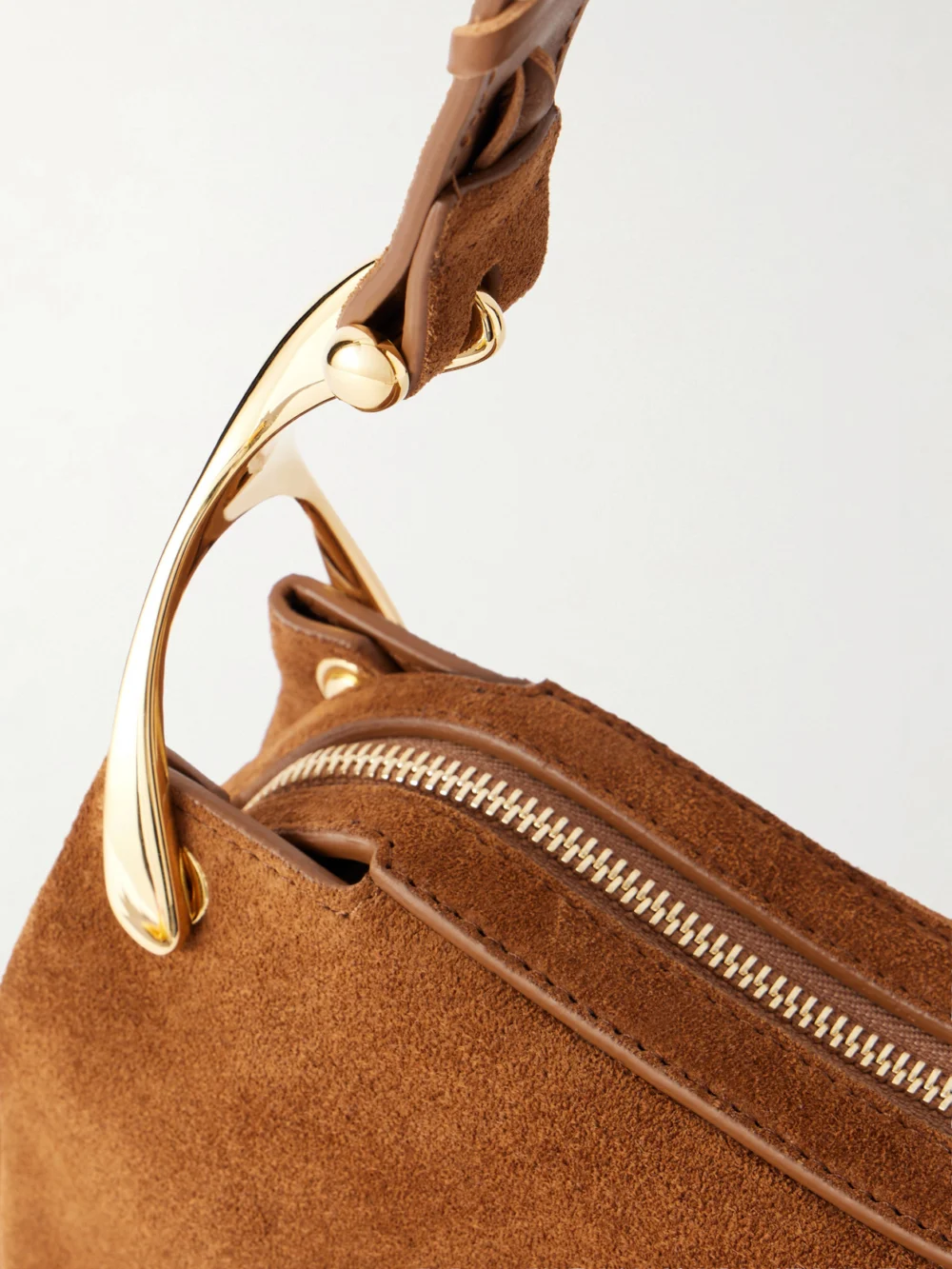 Close-up detail of the Alexander McQueen Wishbone Leather-trimmed Suede Shoulder Bag