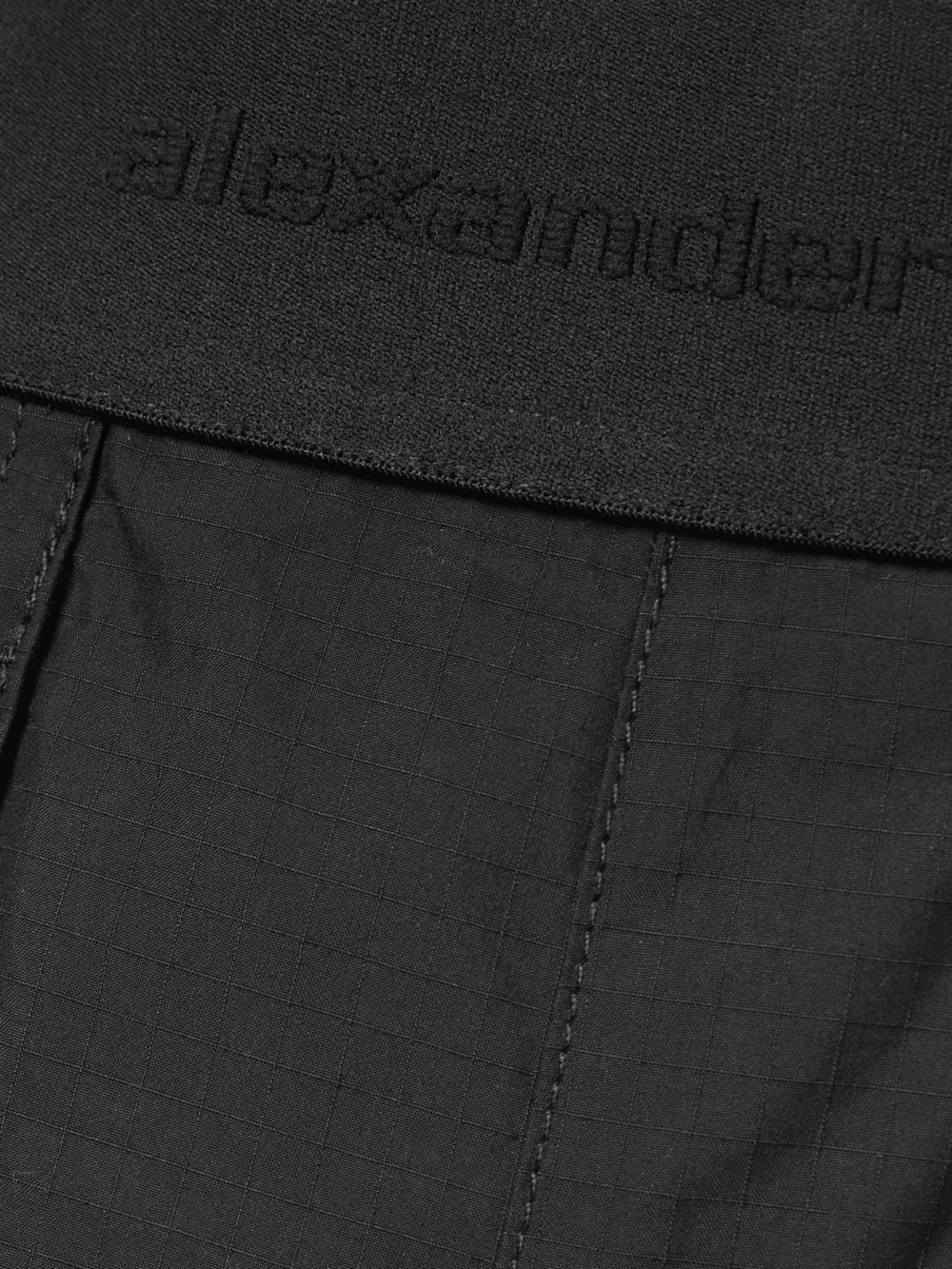 Close-up detail of the Alexander Wang Cotton-blend Ripstop Wide-leg Cargo Pants