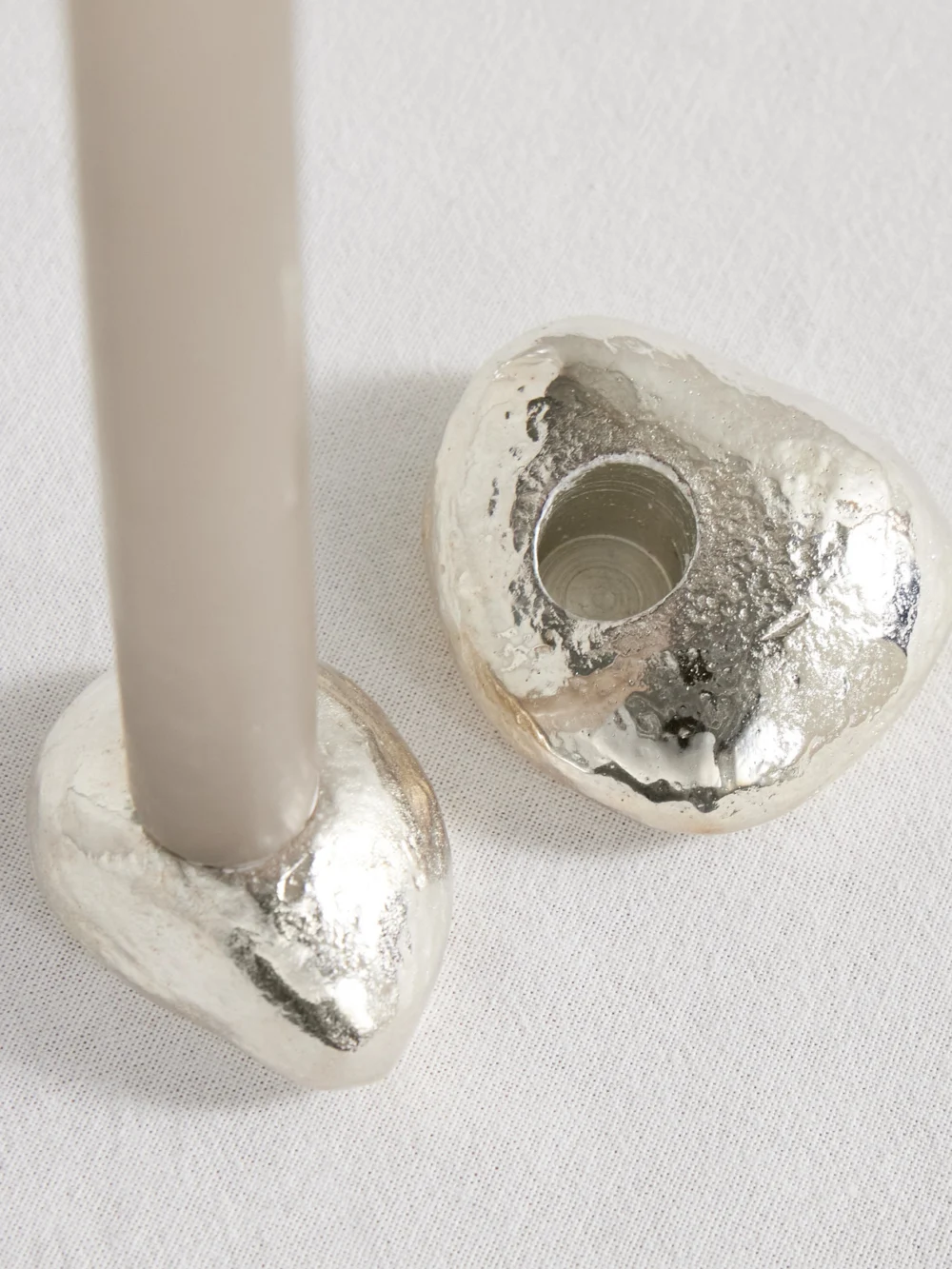 Close-up detail of the Alighieri The Floating Pebble Set of Two Silver-plated Candlesticks
