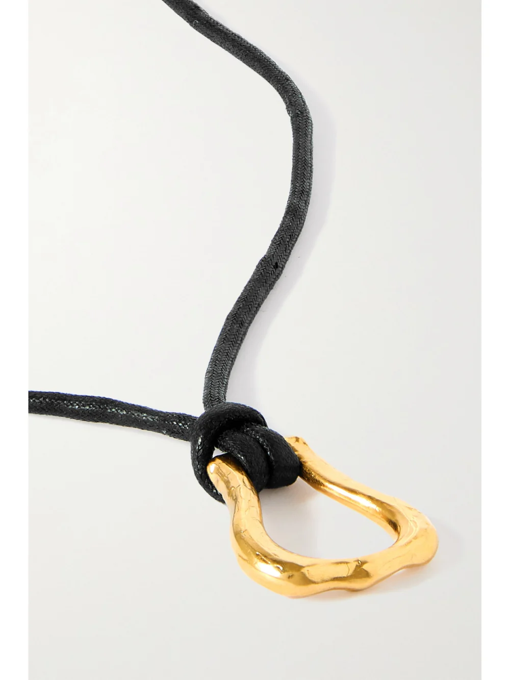 Close-up detail of the Alighieri The Mini Link of Wanderlust Gold-plated Cord Necklace