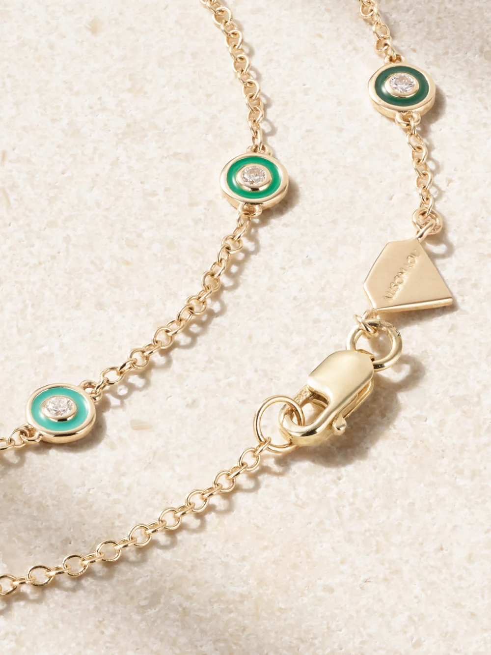 Close-up detail of the Alison Lou Bezel By the Yard 14-karat Gold, Enamel and Diamond Bracelet