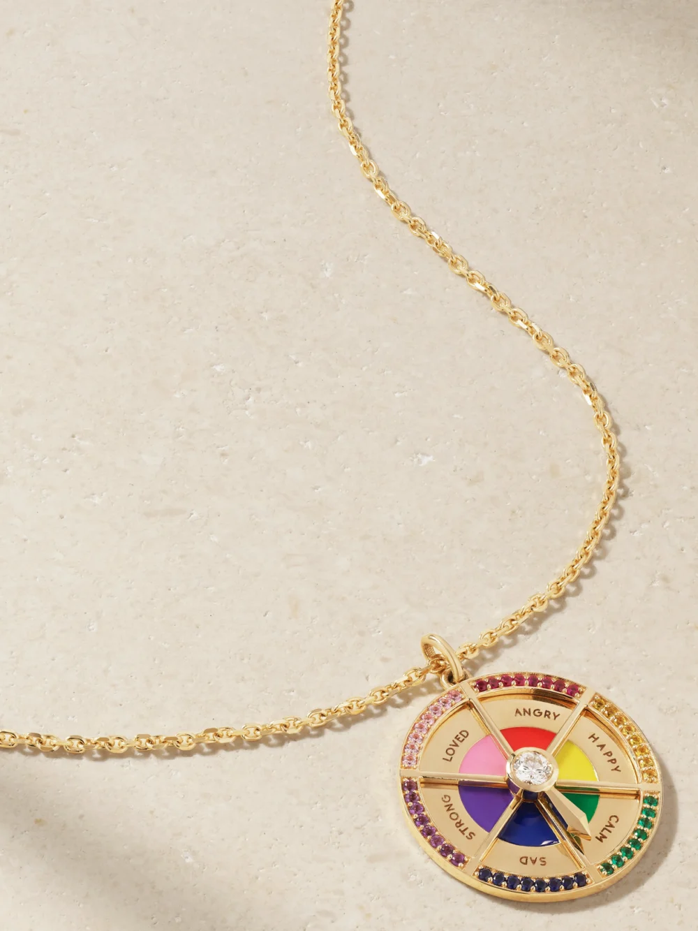 Close-up detail of the Alison Lou In Your Feels Wheel 14-karat Gold and Enamel Multi-stone Necklace