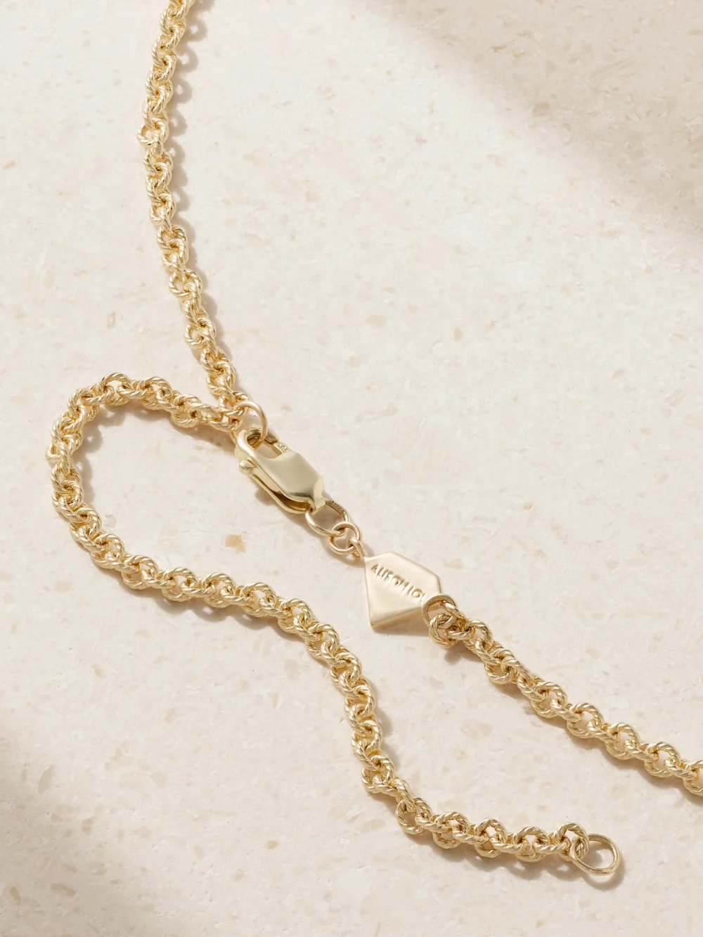 Back view of the Alison Lou Madison 14-karat Gold, Emerald and Enamel Necklace