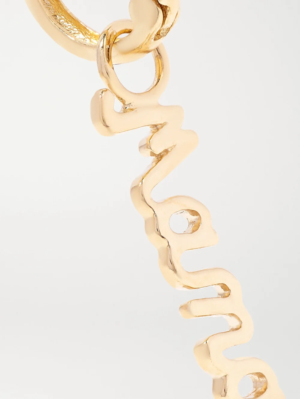 Close-up detail of the Alison Lou Mama Huggy 14-karat Gold Diamond Earring