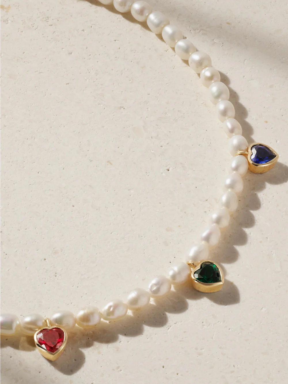 Close-up detail of the Alison Lou So Much Love 14-karat Gold Laboratory-grown Multi-stone Necklace
