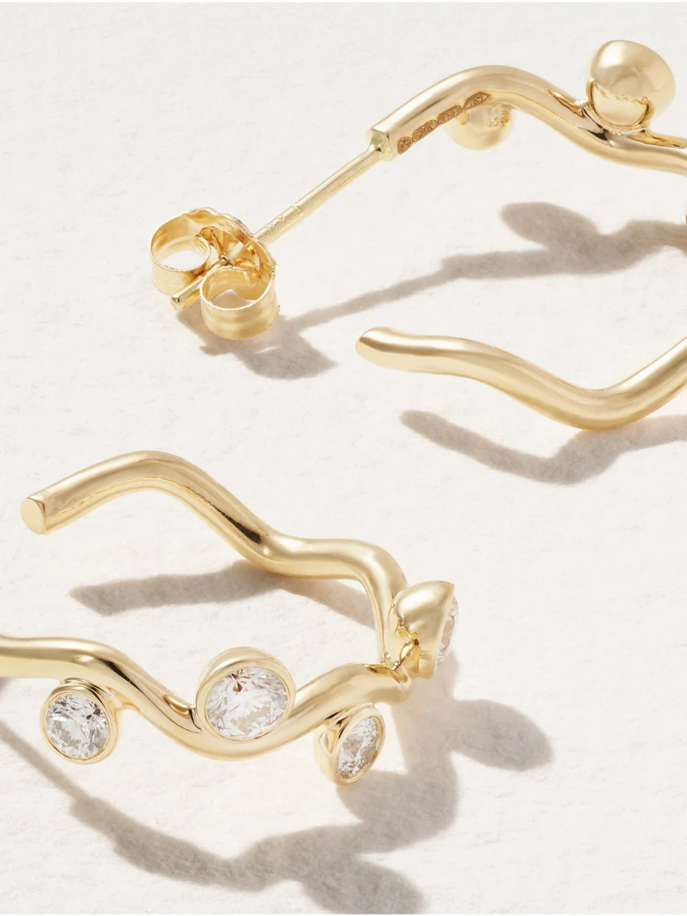 Close-up detail of the Alison Lou Ziggy 14-karat Gold Diamond Hoop Earrings