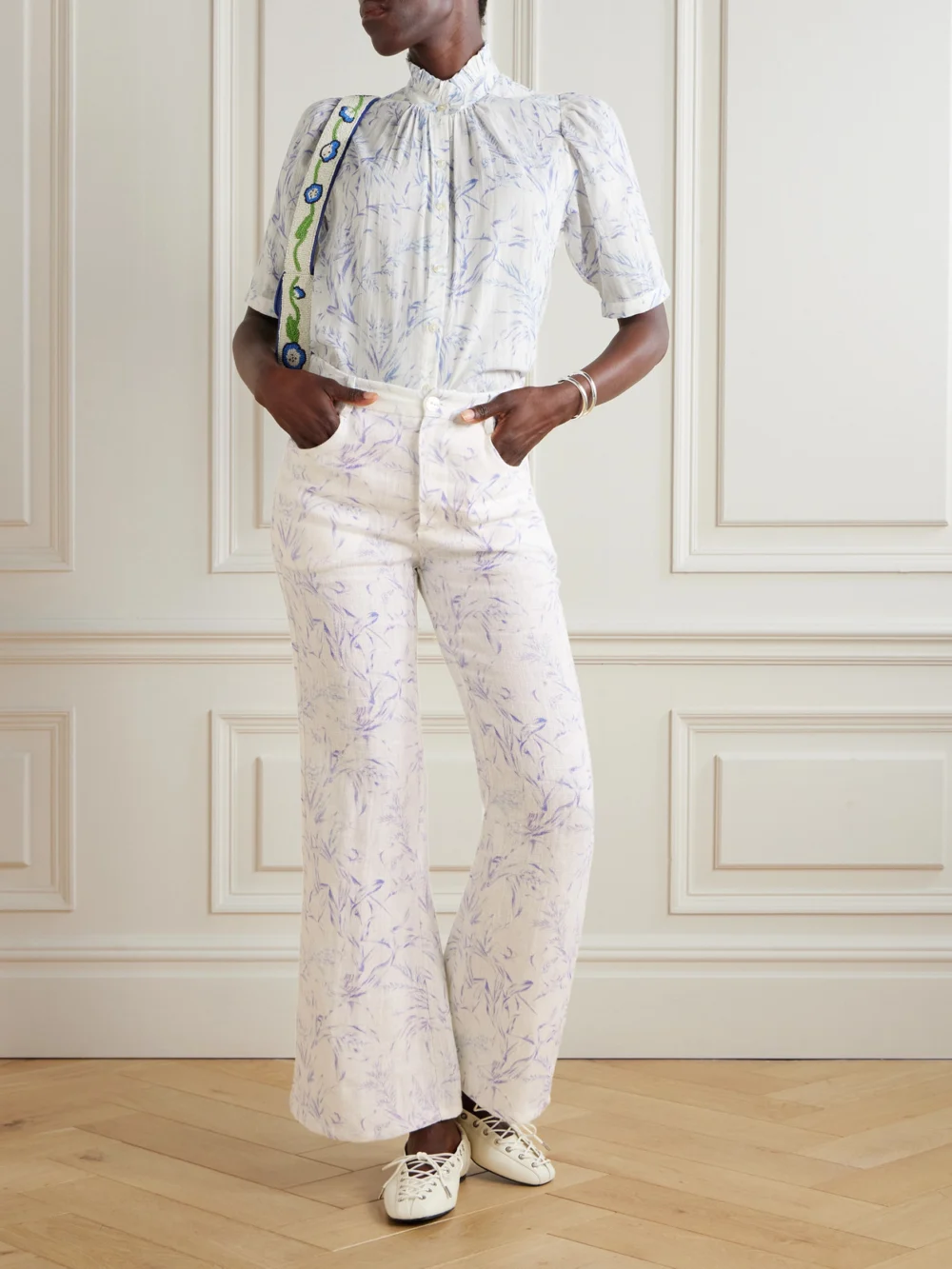Alix Of Bohemia Bunny Avian Printed Linen-canvas Flared Pants, worn by a model