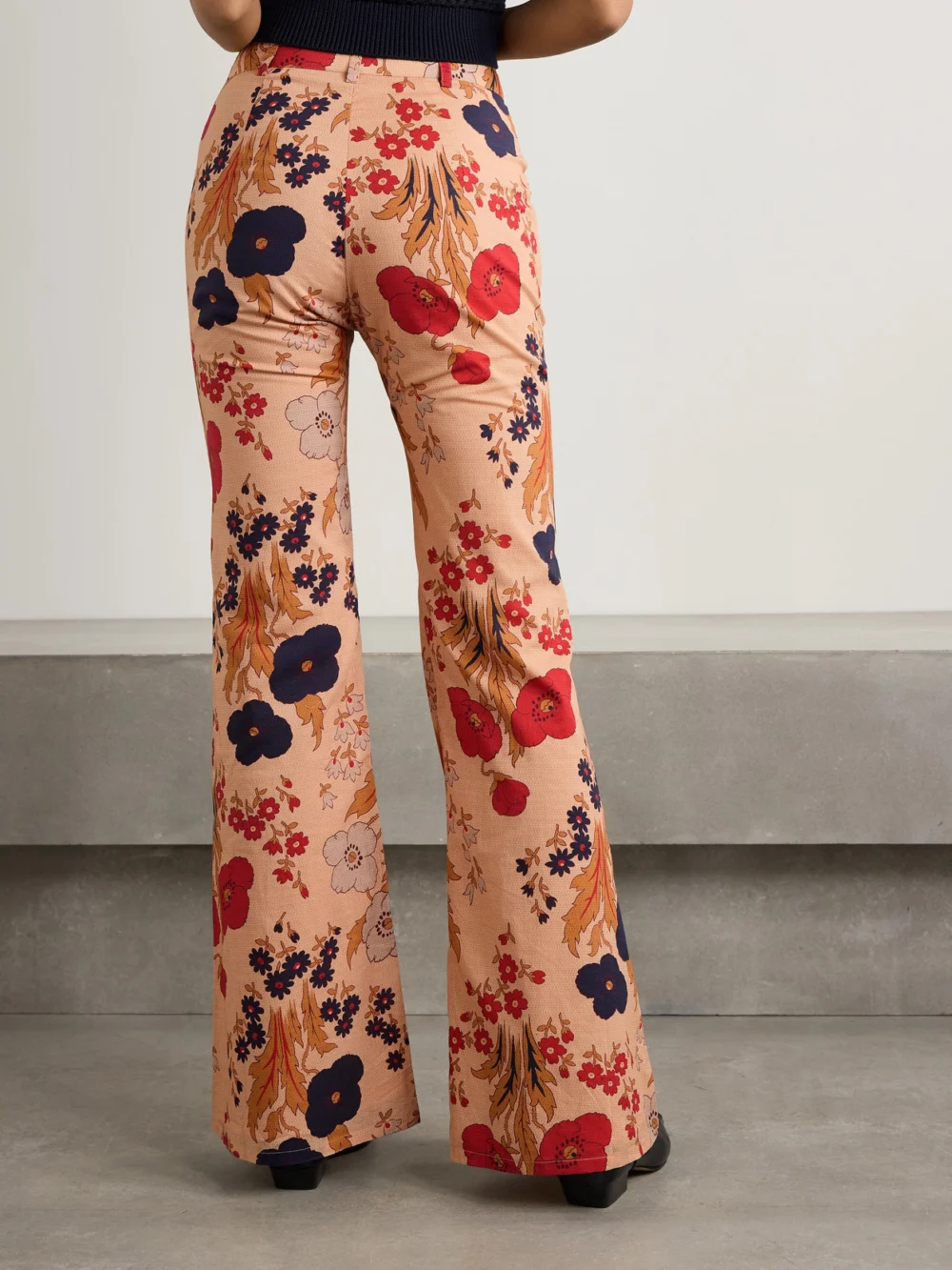 Back view of the Alix Of Bohemia Bunny Bead-embellished Floral-print Cotton-voile Flared Pants