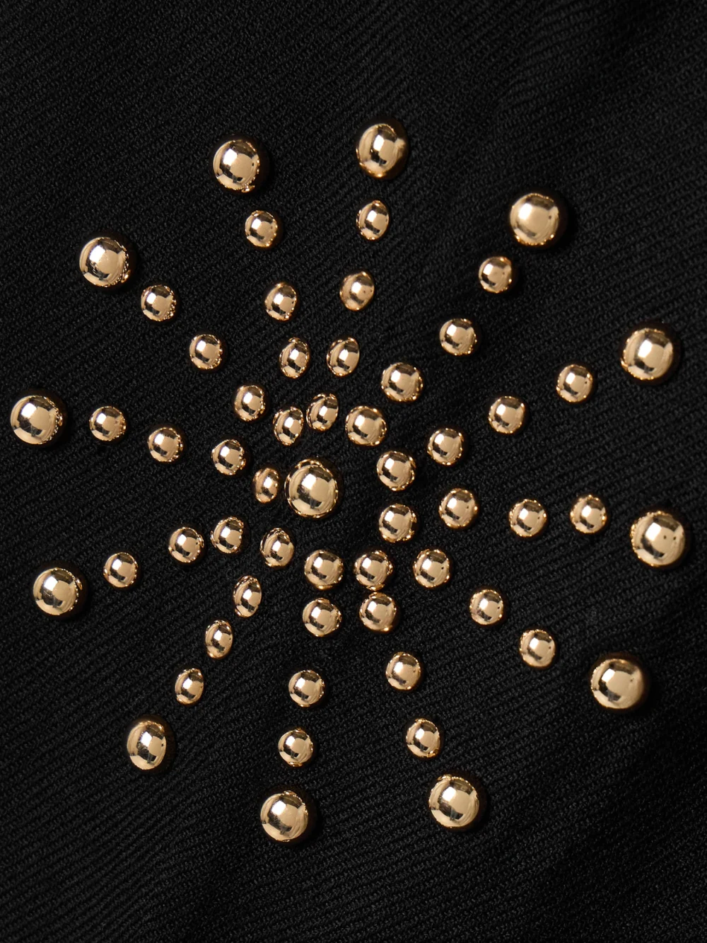 Close-up detail of the Alix Of Bohemia Charlie Casino Studded Wool-twill Flared Pants