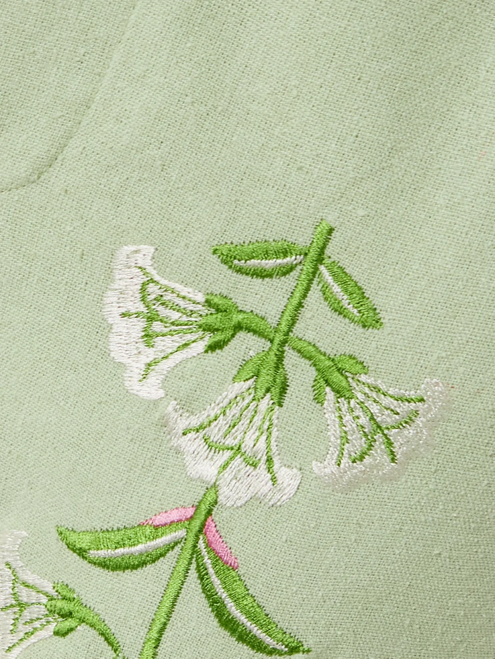Close-up detail of the Alix Of Bohemia Charlie Embroidered Slubbed Silk Flared Pants