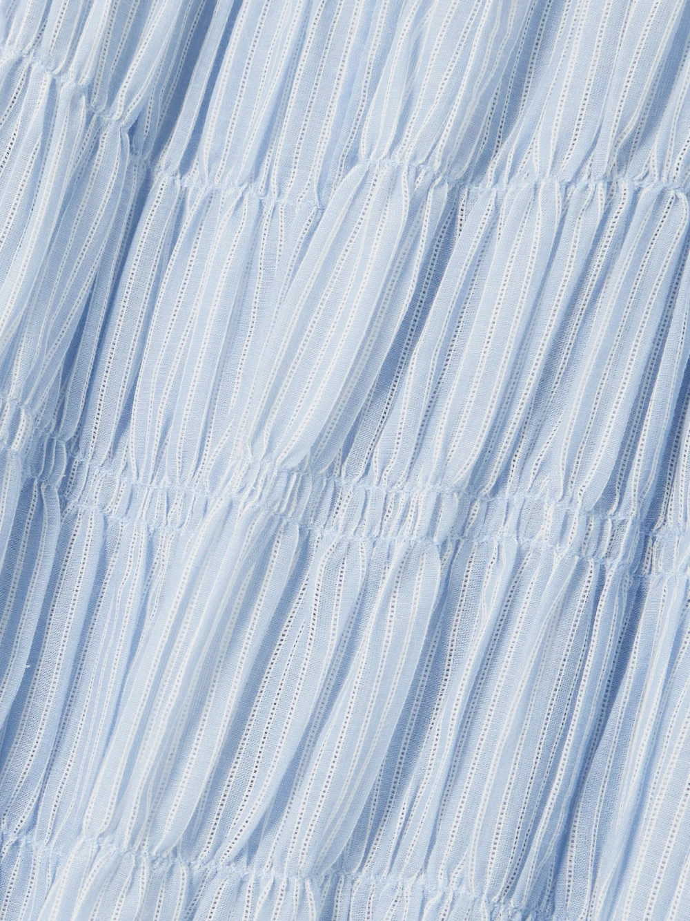 Close-up detail of the Alix Of Bohemia Emrys Tiered Striped Cotton Dress