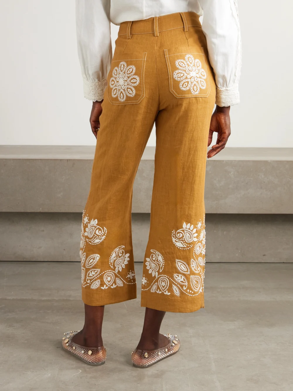 Back view of the Alix Of Bohemia Paige Cropped Embroidered Linen Bootcut Pants