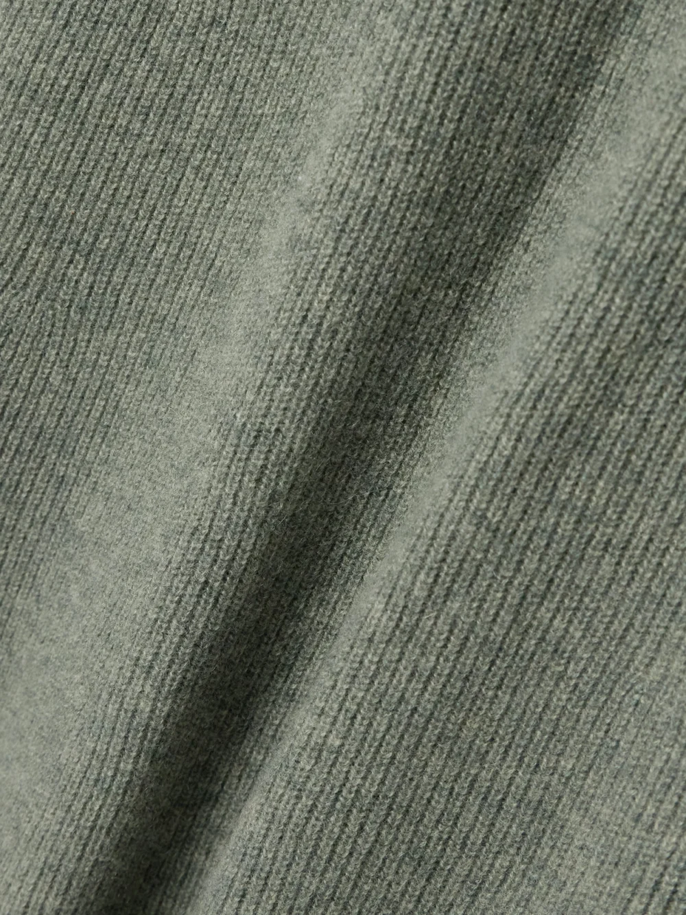 Close-up detail of the Altuzarra Cuddy Ribbed Cashmere Maxi Dress
