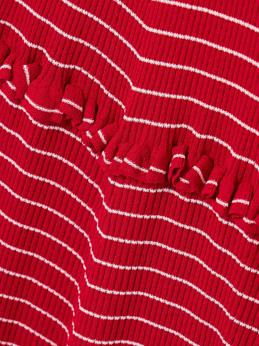 Close-up detail of the Altuzarra Delpini Ruffled Striped Ribbed-knit Midi Dress