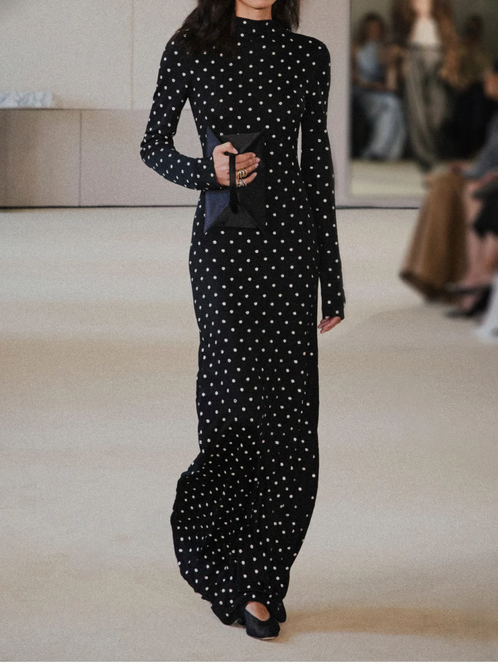 Close-up detail of the Altuzarra Kaplan Eyelet-embellished Jersey Maxi Dress