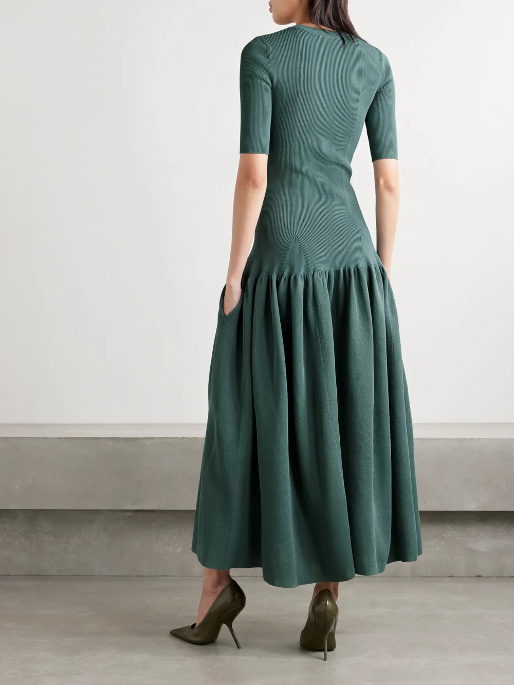 Back view of the Altuzarra Maisie Gathered Metallic Stretch-knit Maxi Dress