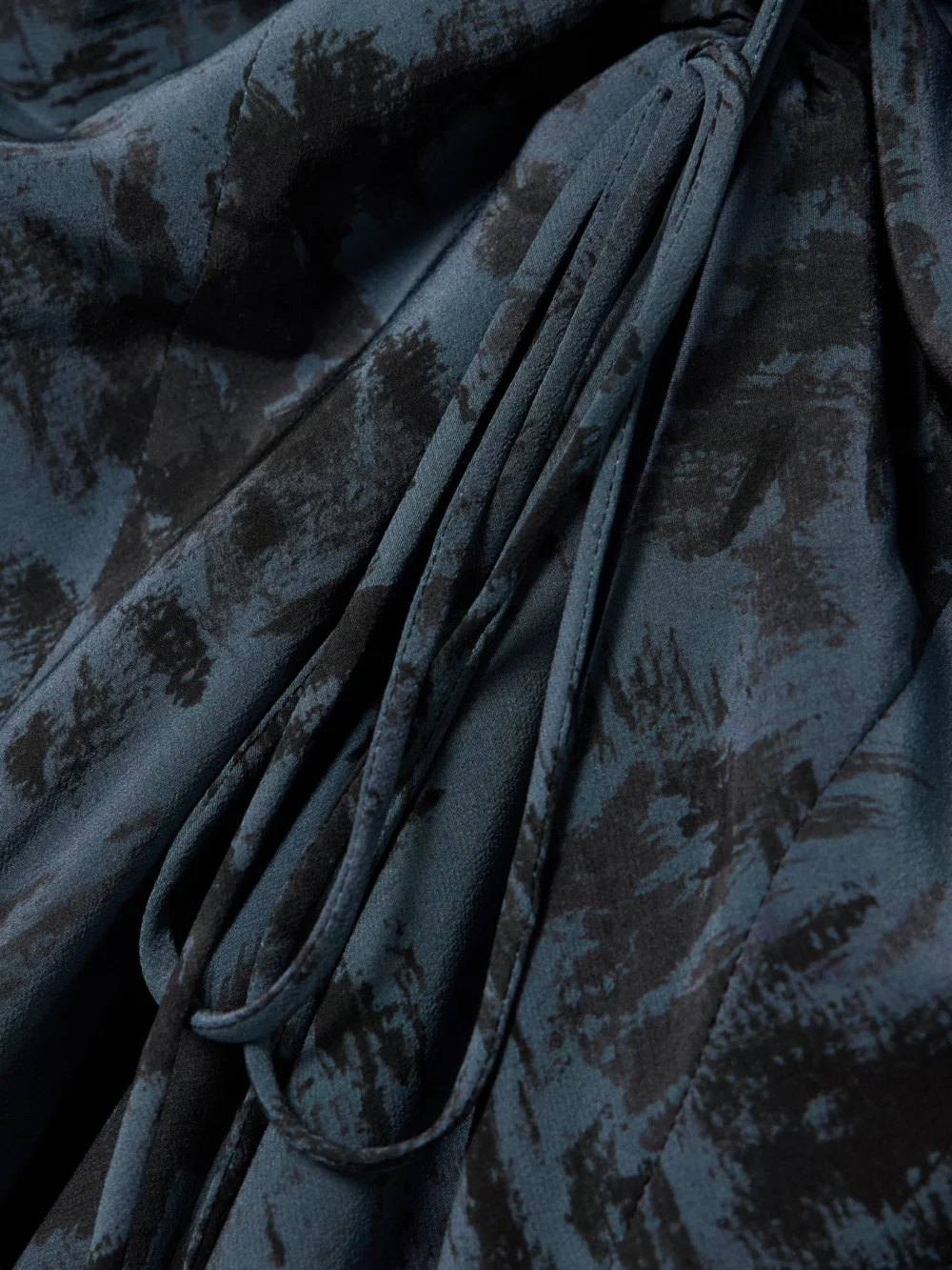 Close-up detail of the Altuzarra Mila Ruched Printed Silk-crepe Midi Dress