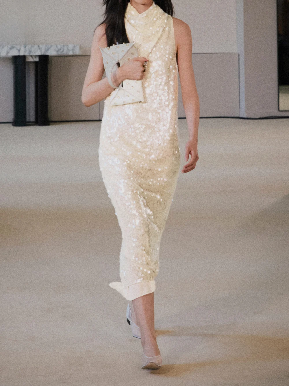 Close-up detail of the Altuzarra Noor Draped Sequined Chiffon Midi Dress