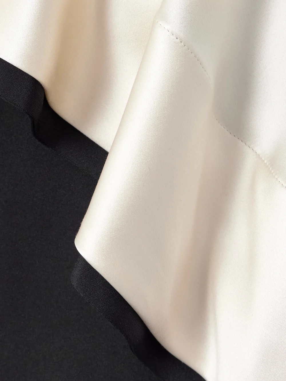 Close-up detail of the Altuzarra Topolino Layered Silk-satin Midi Dress