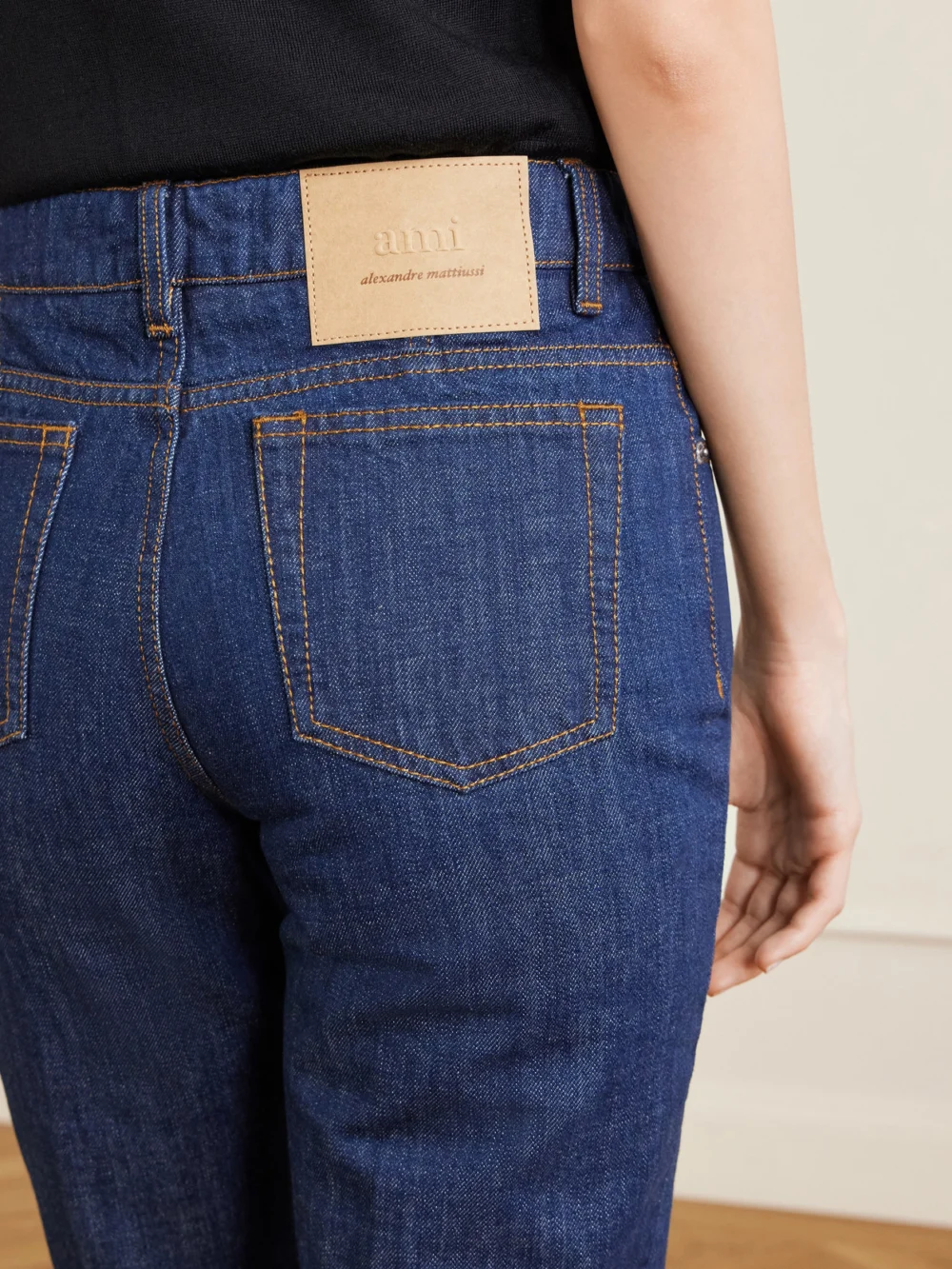Close-up detail of the Ami Paris Bootcut Jeans
