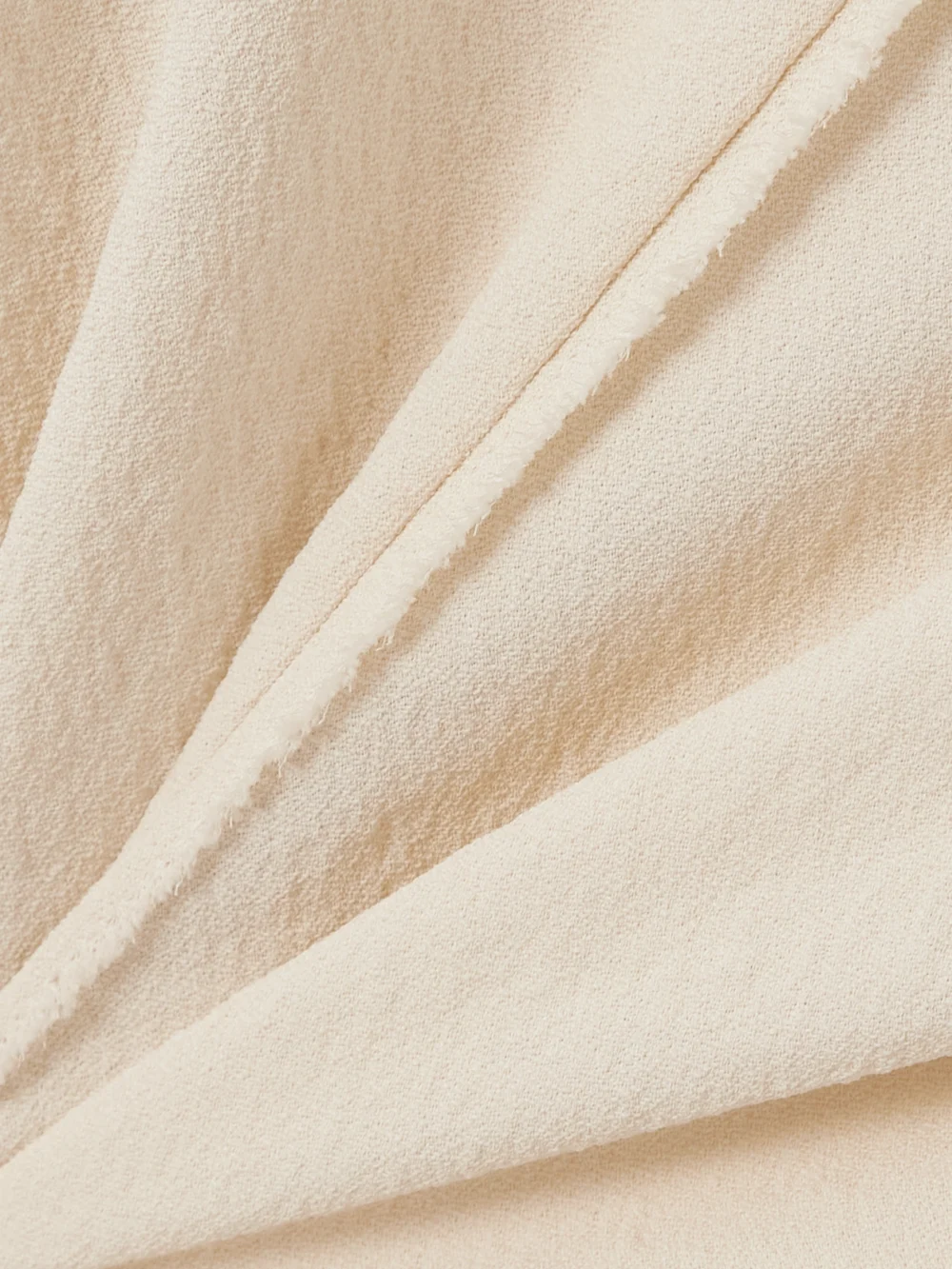 Close-up detail of the Ami Paris Frayed Crepe Tank