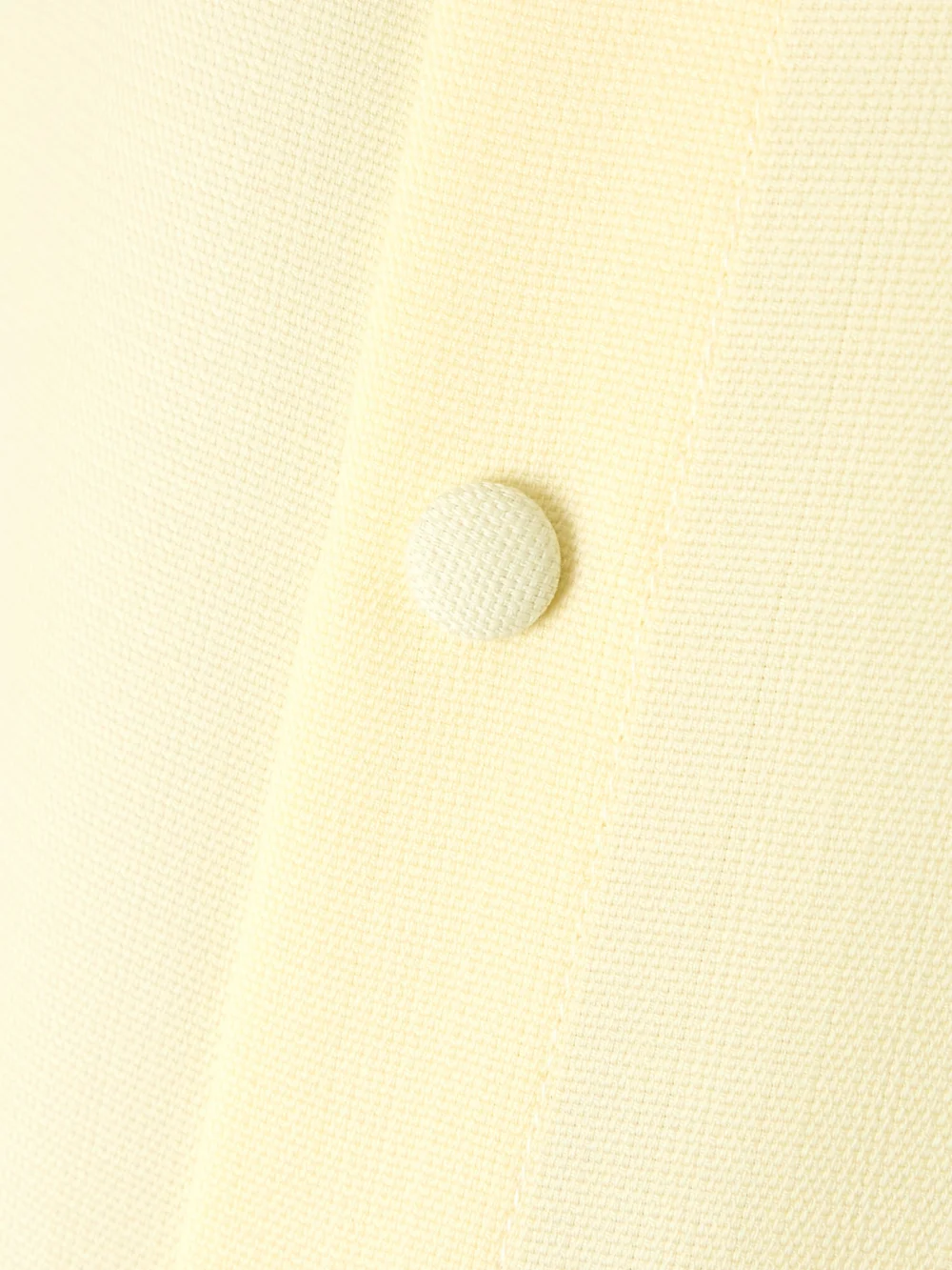 Close-up detail of the Ami Paris Grain De Poudre Wool Mini Shirt Dress