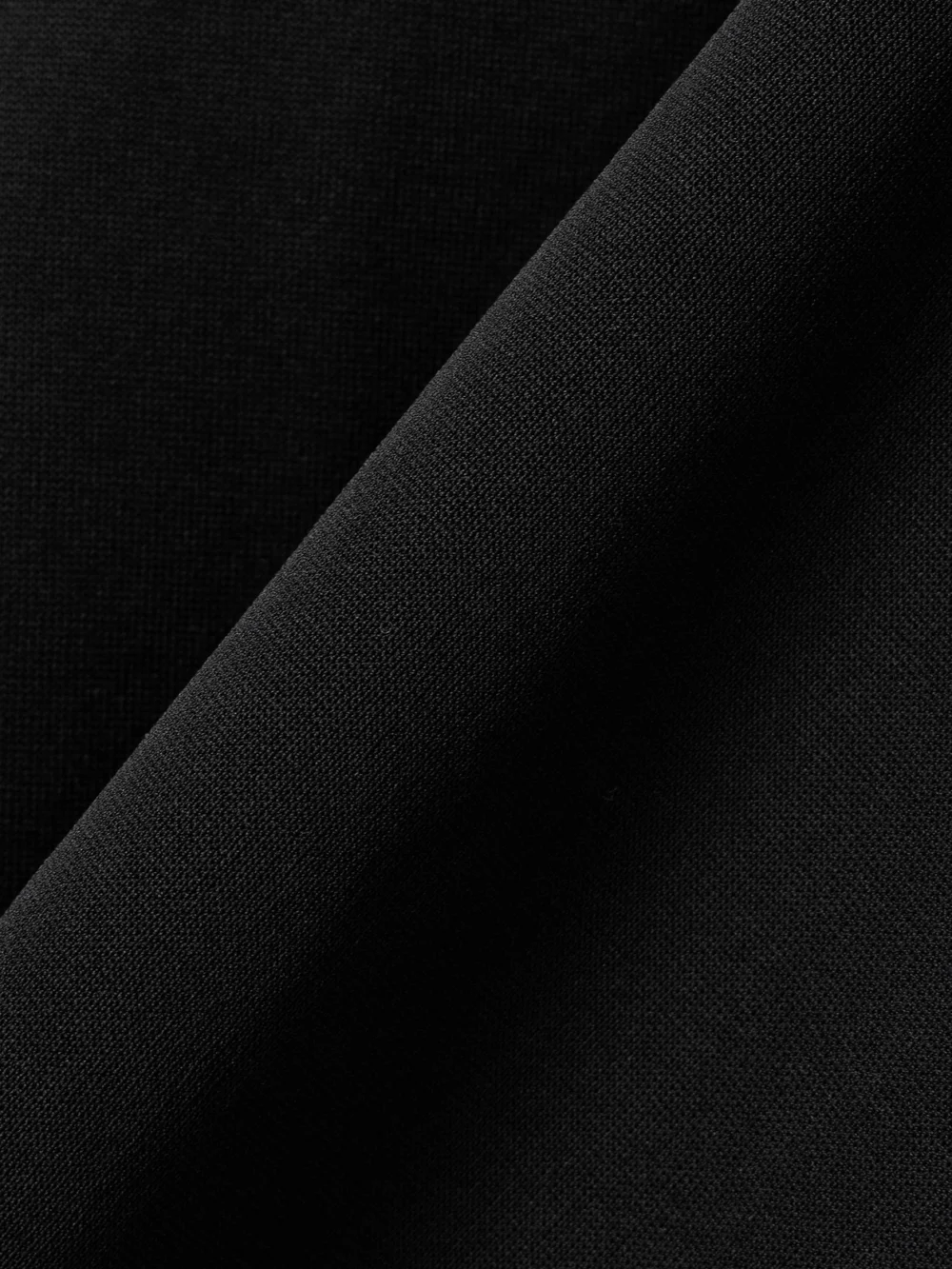 Close-up detail of the Ami Paris Knitted Polo Shirt