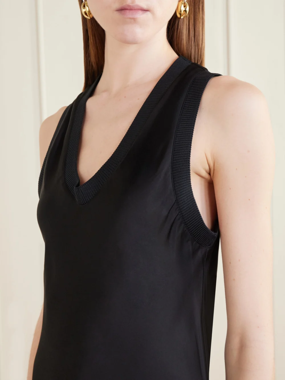 Close-up detail of the Ami Paris Ribbed-knit Trimmed Satin Maxi Dress