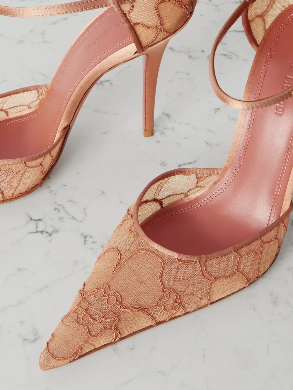 Close-up detail of the Amina Muaddi Barbara Satin-trimmed Corded Lace Pumps