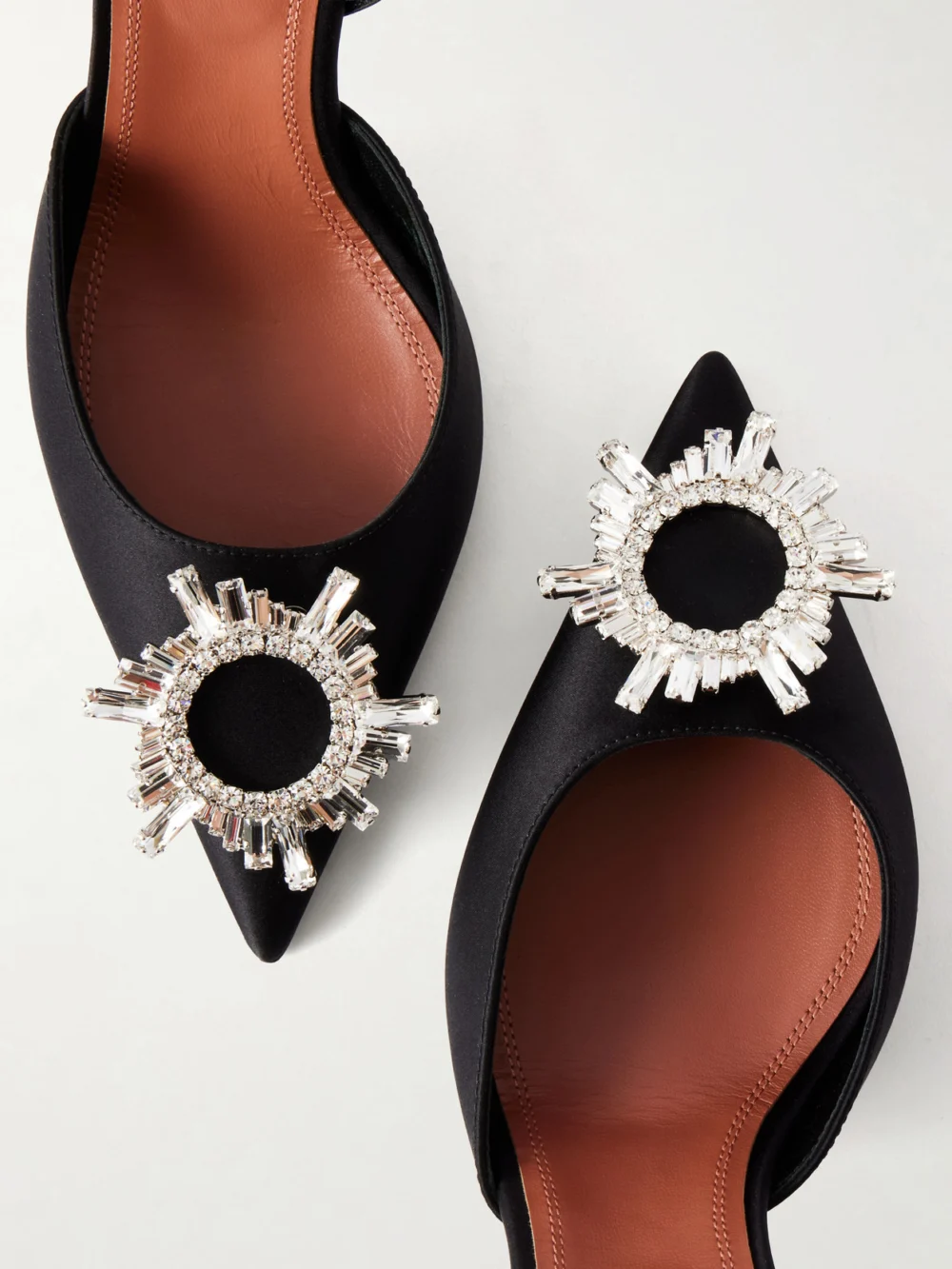 Close-up detail of the Amina Muaddi Begum 95 Swarovski Crystal-embellished Satin Slingback Pumps