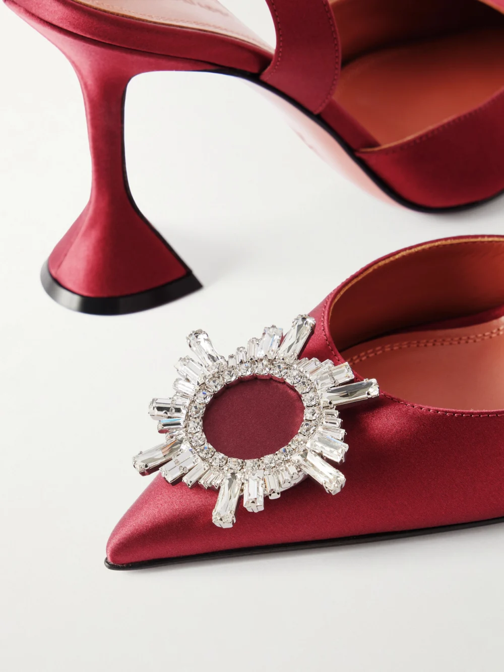 Close-up detail of the Amina Muaddi Begum Swarovski Crystal-embellished Satin Slingback Pumps