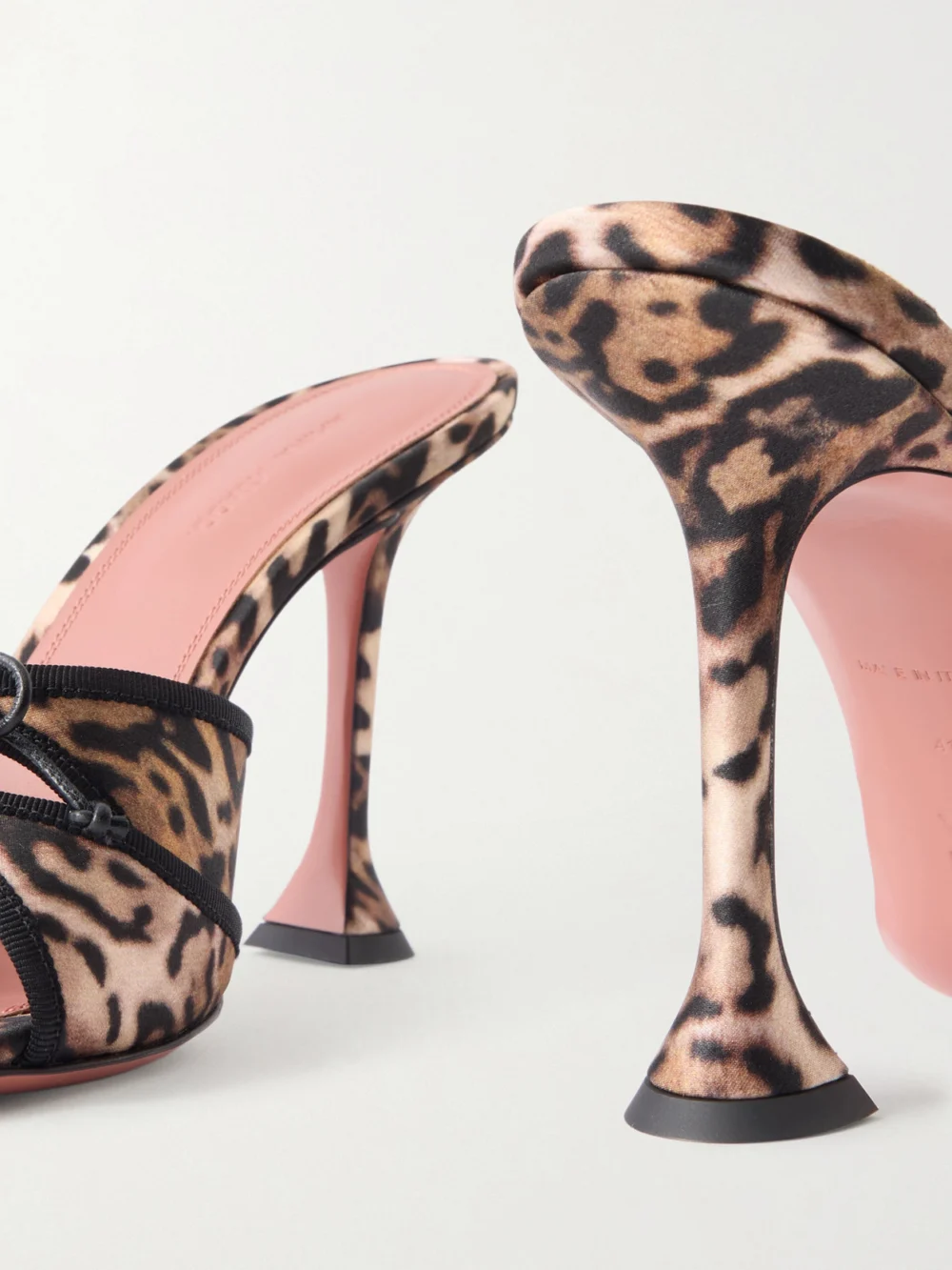 Close-up detail of the Amina Muaddi Eleonora Bow-detailed Leopard-print Satin Mules