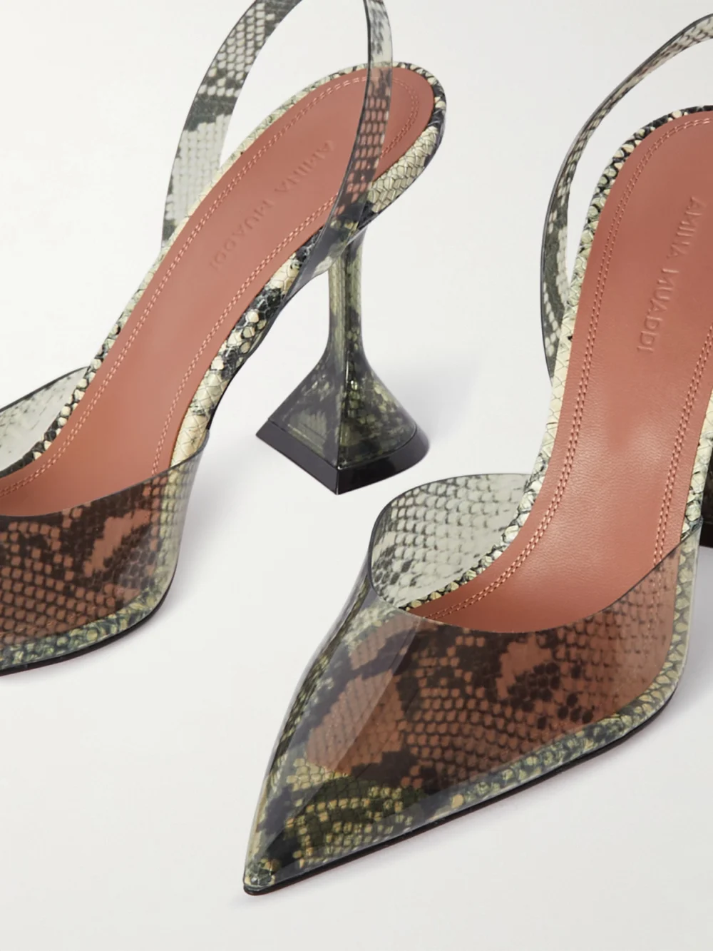Close-up detail of the Amina Muaddi Holli Snake-effect Pvc Slingback Pumps