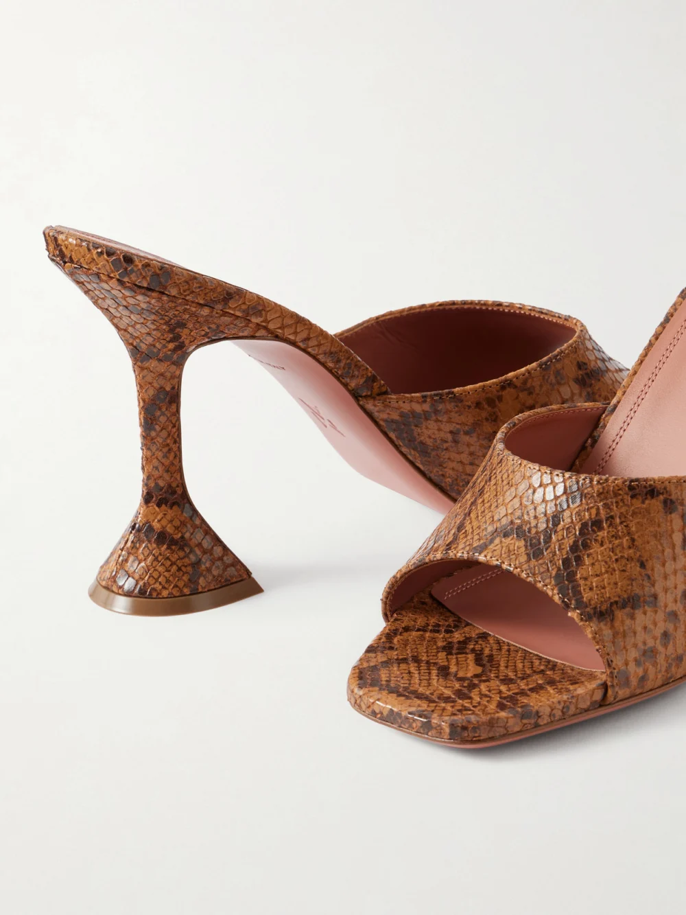 Close-up detail of the Amina Muaddi Lupita 95 Snake-effect Leather Mules
