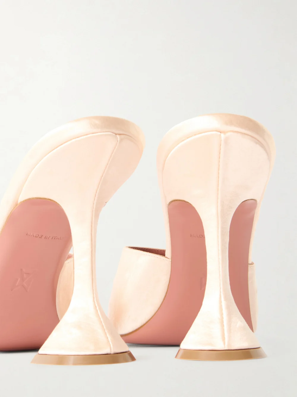 Close-up detail of the Amina Muaddi Lupita Ostrich-effect Satin Mules