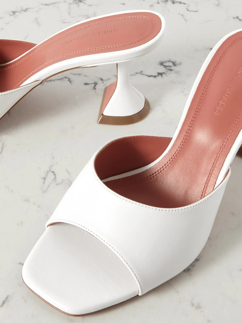 Close-up detail of the Amina Muaddi Lupita Textured-leather Pumps