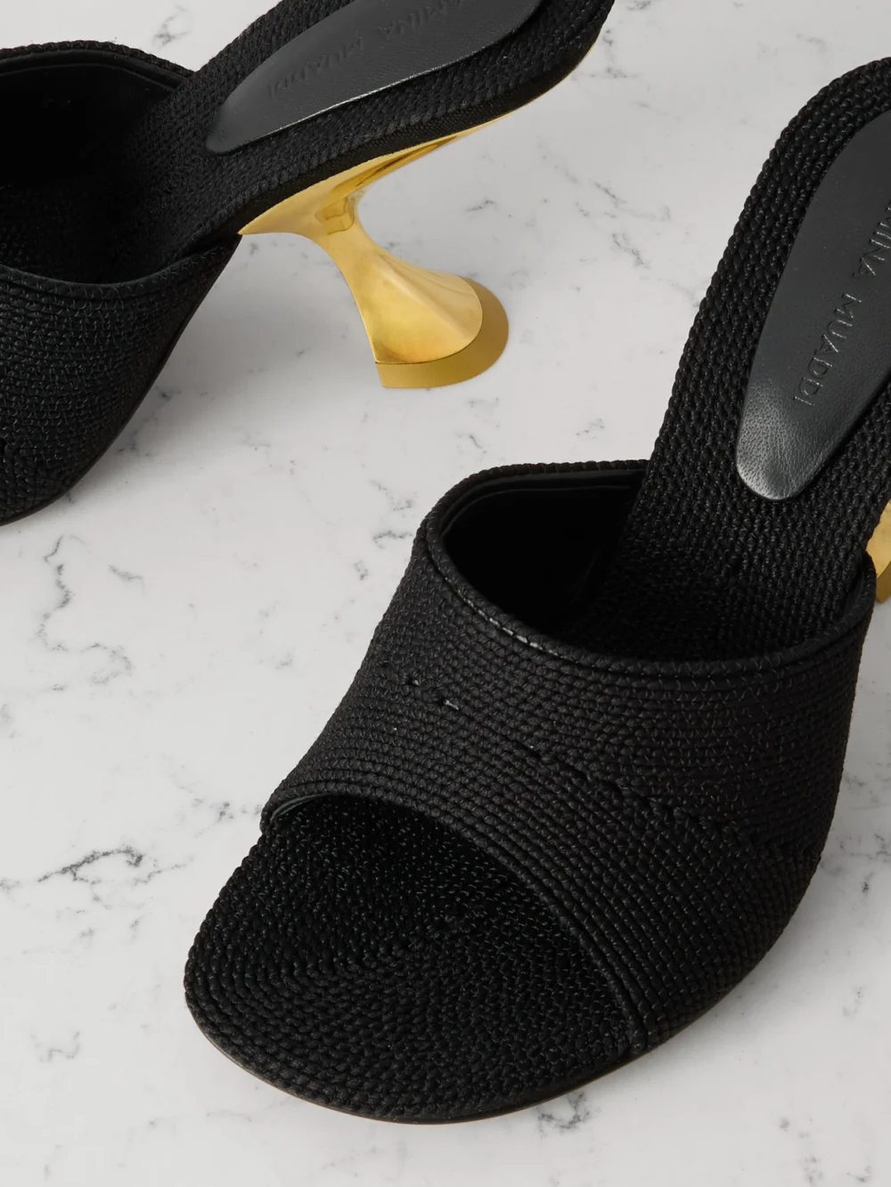 Close-up detail of the Amina Muaddi Taylor Cotton Mules