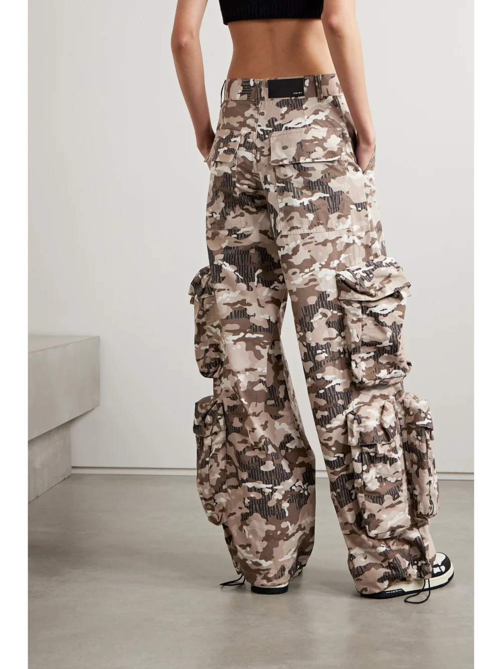 Back view of the Amiri Camouflage-print Cotton-ripstop Wide-leg Cargo Pants