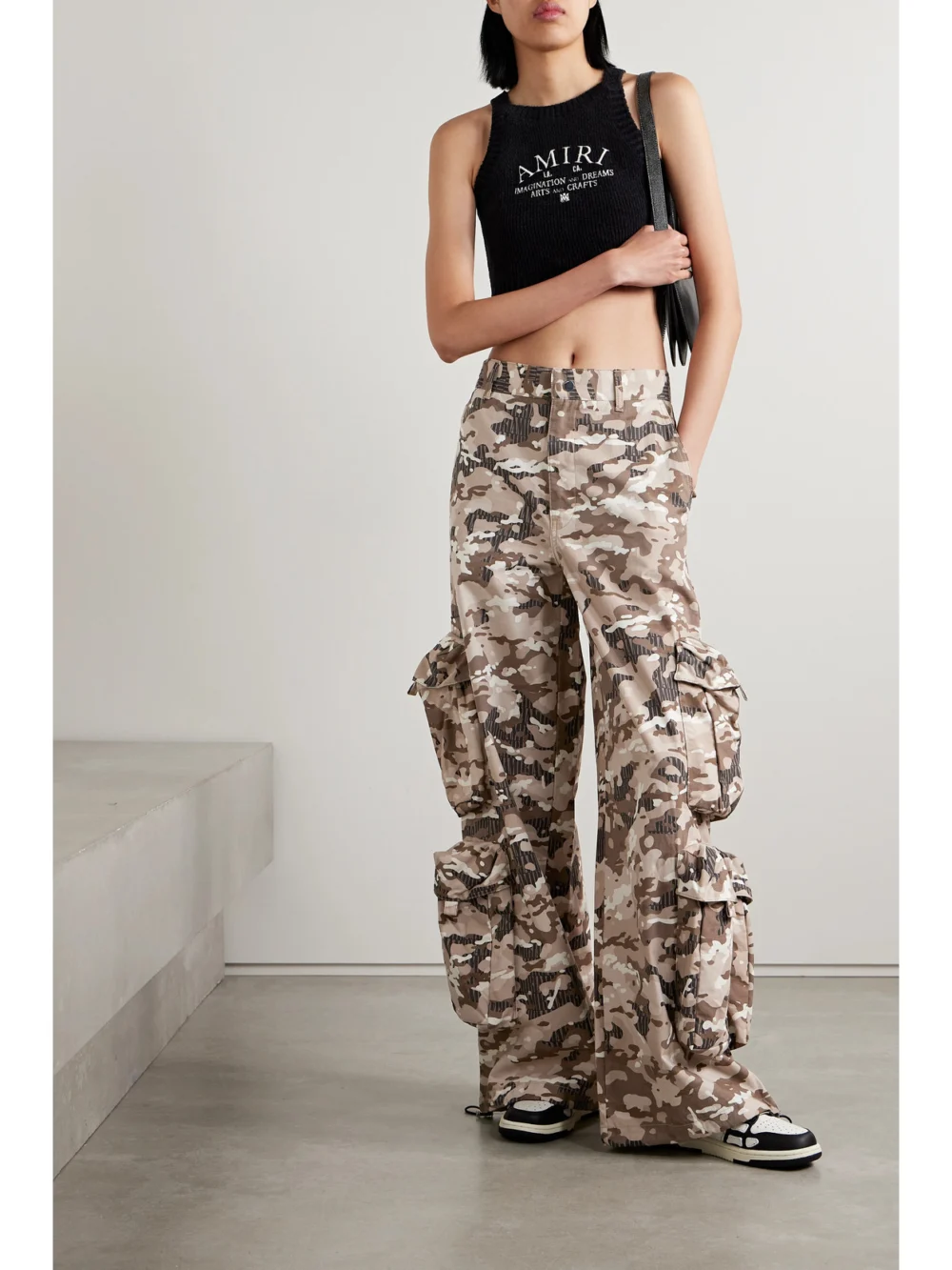 Amiri Camouflage-print Cotton-ripstop Wide-leg Cargo Pants, worn by a model