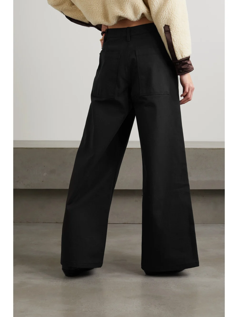Back view of the Amiri Cotton-canvas Wide-leg Pants