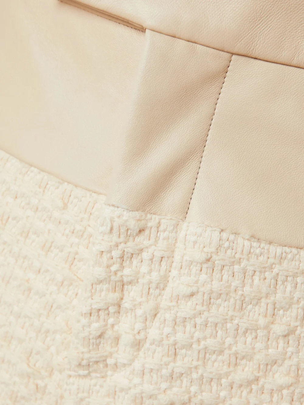 Close-up detail of the Amiri Leather-trimmed Cotton-blend Tweed Bootcut Pants