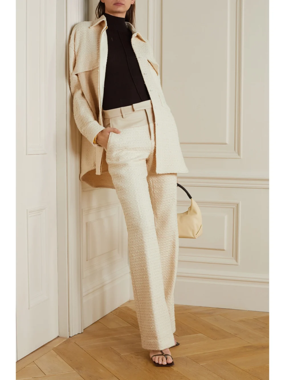 Amiri Leather-trimmed Cotton-blend Tweed Bootcut Pants, worn by a model