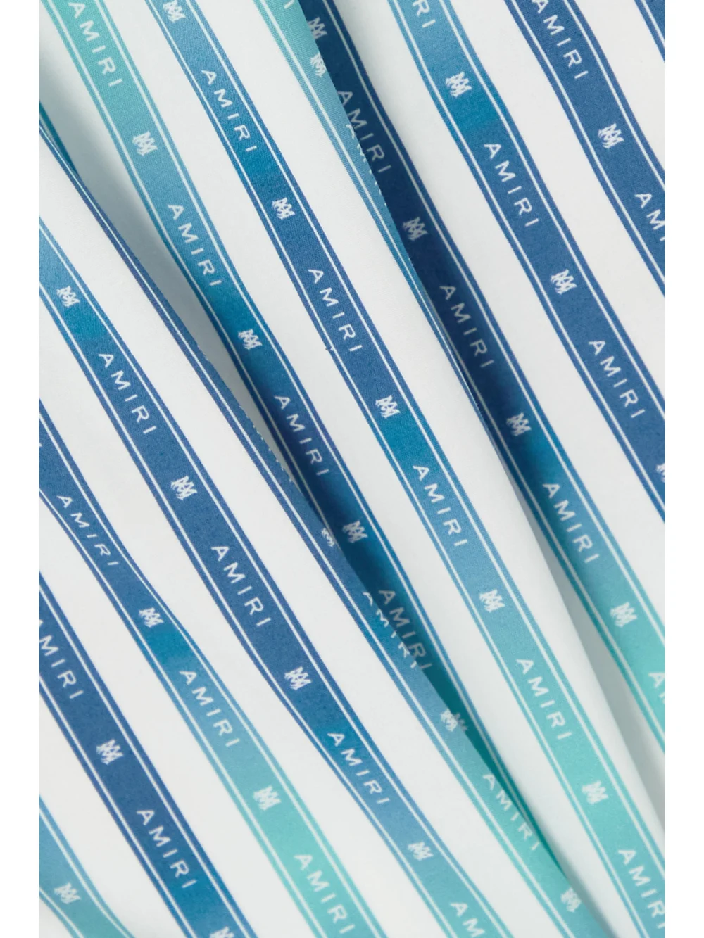 Close-up detail of the Amiri Striped Cotton-poplin Shorts