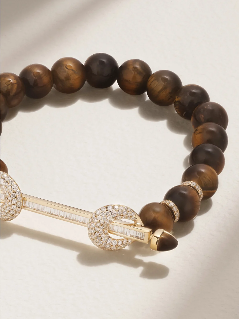 Close-up detail of the Ananya Chakra 18-karat Gold, Tiger's Eye and Diamond Bracelet