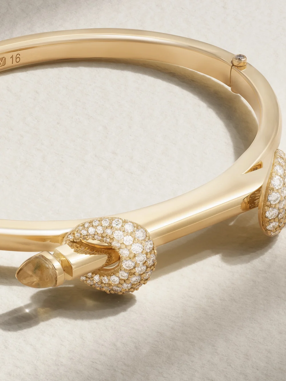 Close-up detail of the Ananya Chakra Icon 18-karat Gold, Diamond and Quartz Bangle