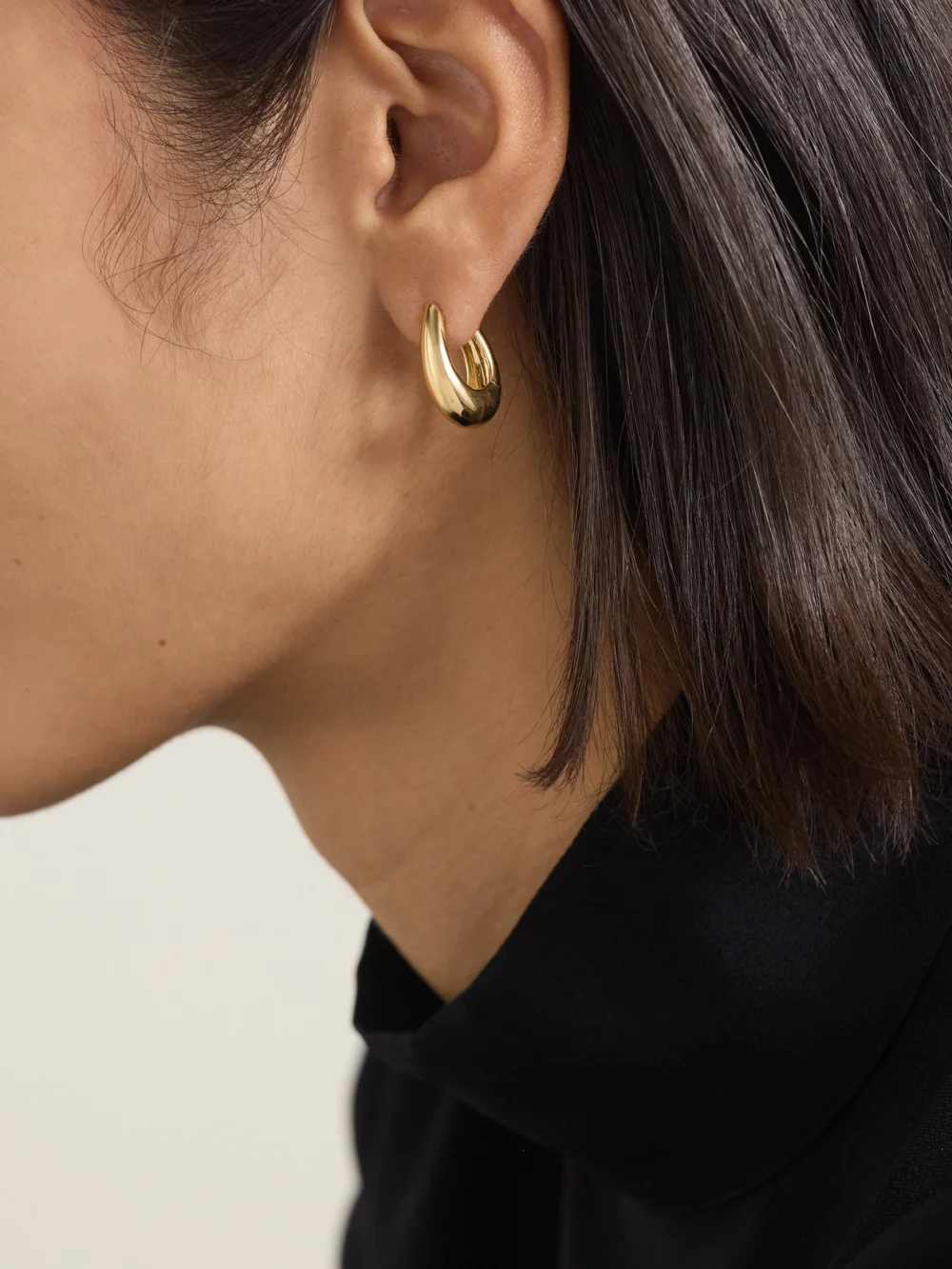 Ananya Chakra Icon 18-karat Gold Hoop Earrings, styled view