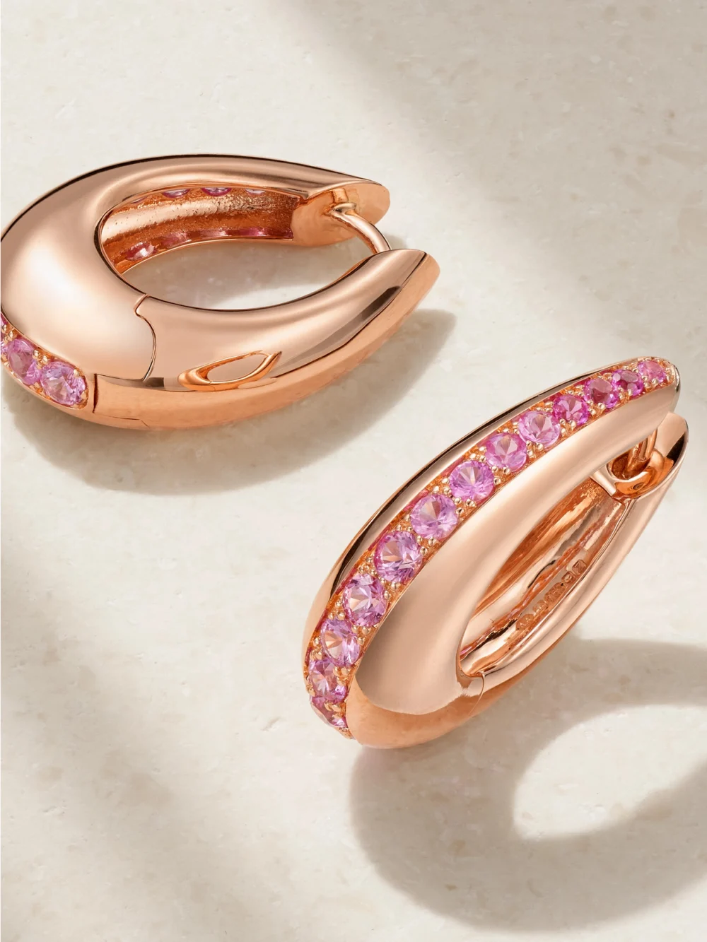 Close-up detail of the Ananya Chakra Icon 18-karat Rose Gold Sapphire Earrings